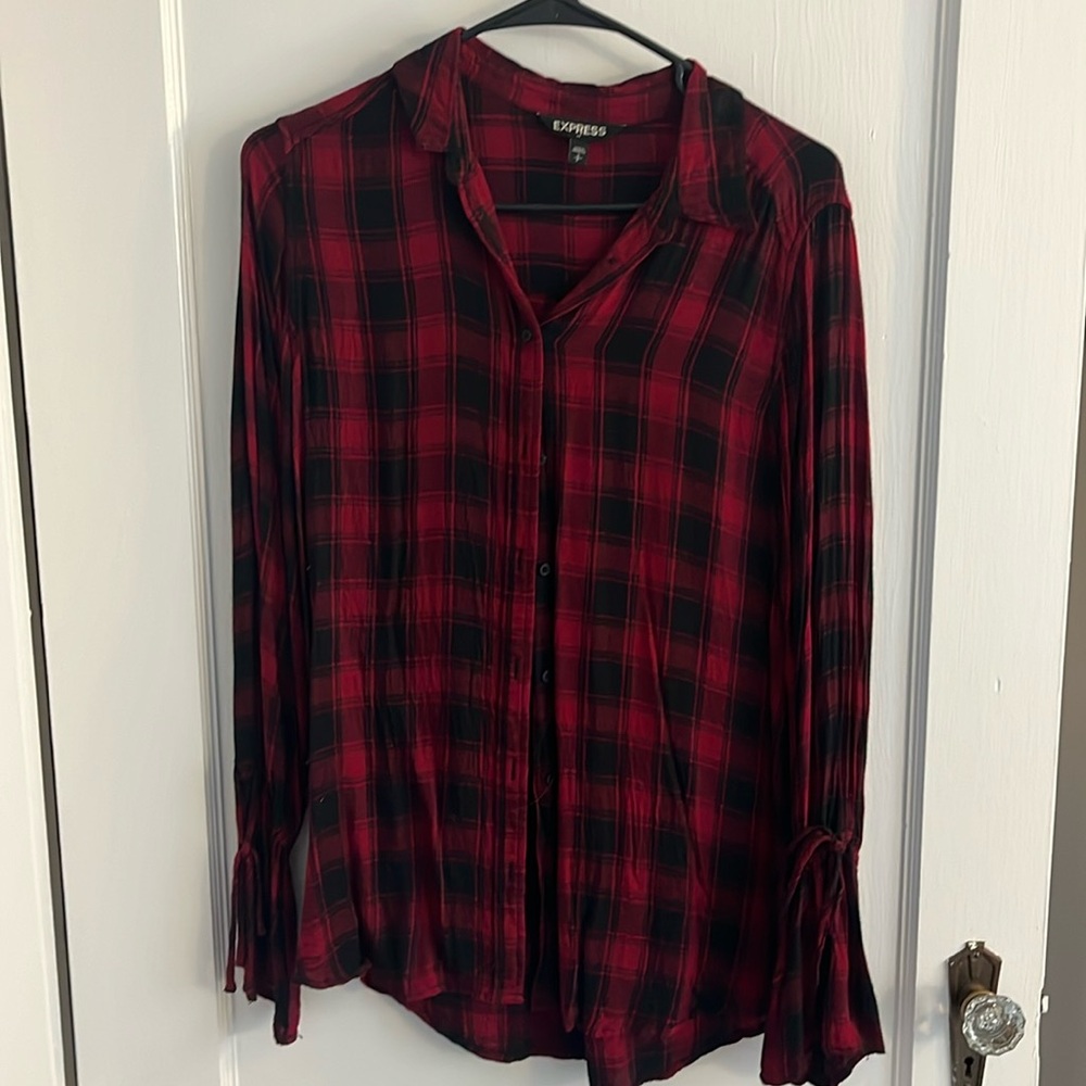 Express small flannel style blouse with decorative tie up sleeves